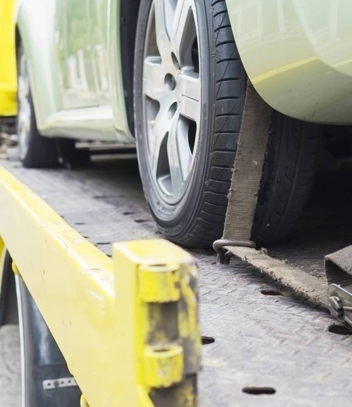 car-transporter-breakdown-lorry-working-using-locked-belt-transport-other-green-car car transporter breakdown lorry during working using locked belt transport other green car for repairing at car center in a bangkok city thailand
